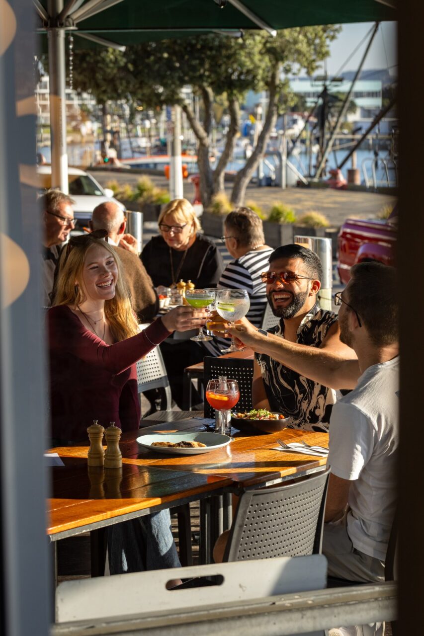 The Gintrap Restaurant & Bar - diners on the waterfront deck overlooking Ahuriri harbour in Napier